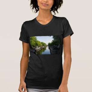 Amsterdam Canal with Houseboats and Lush Trees T-Shirt