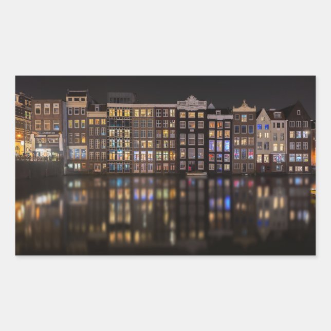 Amsterdam houses with colourful lights in the nigh rectangular sticker (Front)