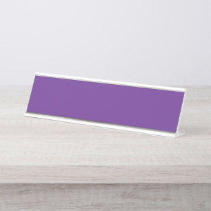 An abstract blend of vibrant purple and pink hues  desk name plate