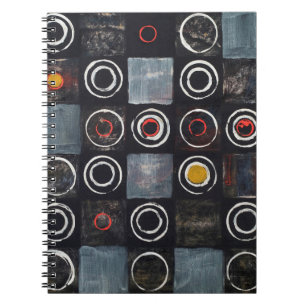 An abstract painting; a grid of stamped circles on notebook