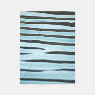 An abstract wave ripple background made from water fleece blanket