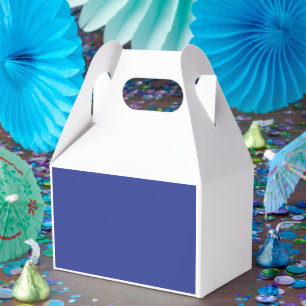an aeroplane flying in the sky with a blue backgro favour box