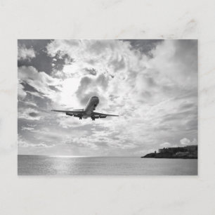 An airliner comes in for a landing at Princess Postcard