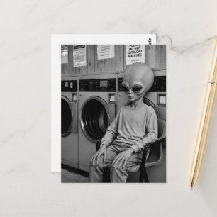 An alien at the laundromat postcard