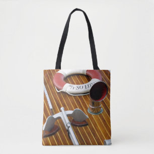 An Anchor And A Life-Buoy On A Wooden Boat Tote Bag