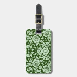 An antique floral damask luggage tag