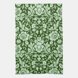 An antique floral damask tea towel