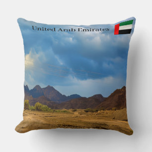 An arid landscape under a dramatic, cloudy sky cushion