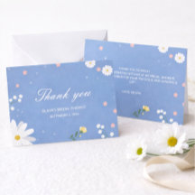 An elegant wedding in light blue with wildflowers.