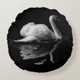 An Elegant White Swan On A Black Background Round Cushion
