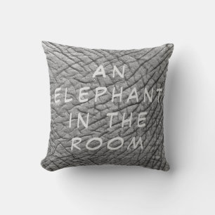 An elephant in the room skin photo with white text cushion