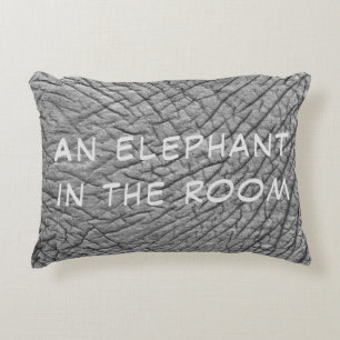 An elephant in the room skin photo with white text decorative cushion