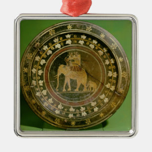 An elephant used in war against the metal tree decoration