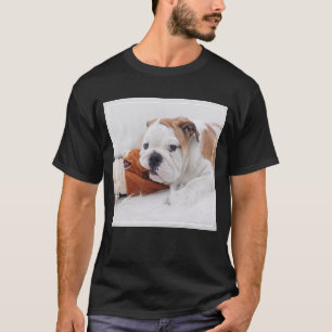 An English Bulldog Puppy Playing With A Bulldog T-Shirt