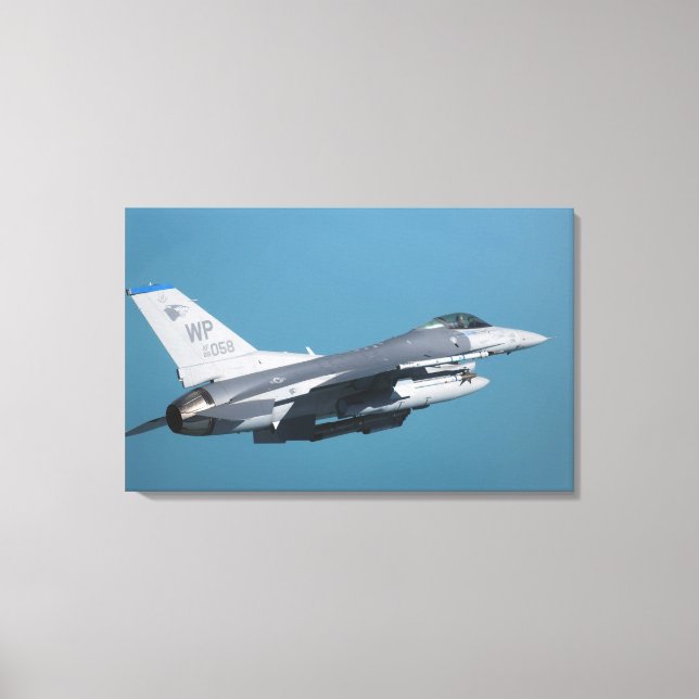 An F-16 Fighting Falcon in flight Canvas Print (Front)