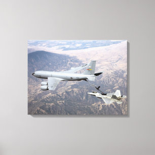 An F-22 Raptor receives fuel from a KC-135 Canvas Print