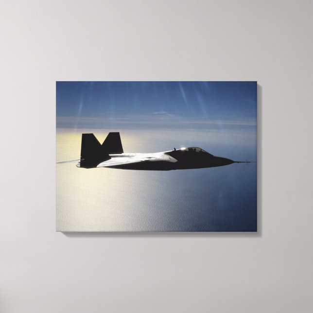 An F/A-22 Raptor flies a training mission 2 Canvas Print (Front)