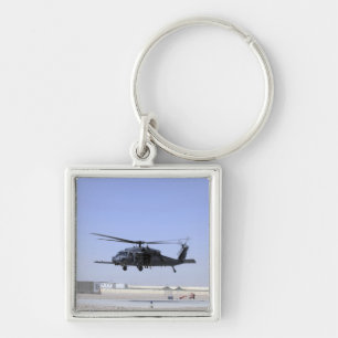 An HH-60G Pave Hawk taking off from Camp Bastio Key Ring