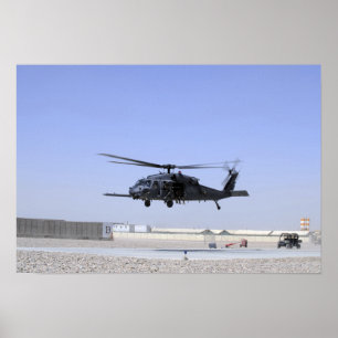 An HH-60G Pave Hawk taking off from Camp Bastio Poster