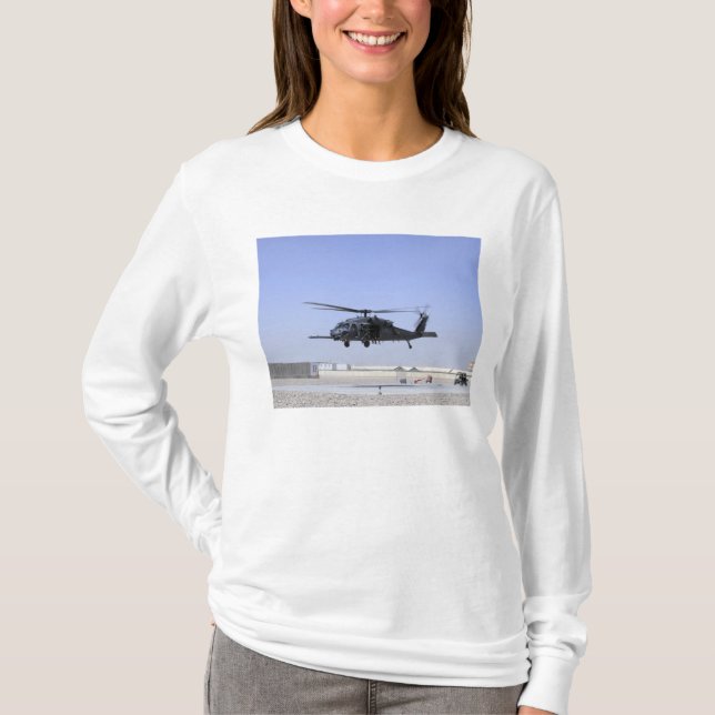 An HH-60G Pave Hawk taking off from Camp Bastio T-Shirt (Front)