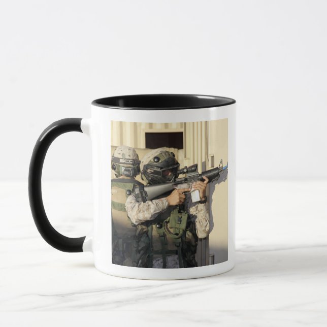 An infantry scout aims his weapon mug (Left)