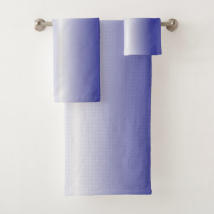An intricate blue geometric pattern with symmetric bath towel set