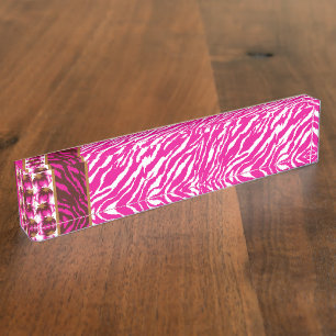 An intricate floral pattern in pink and white, art nameplate