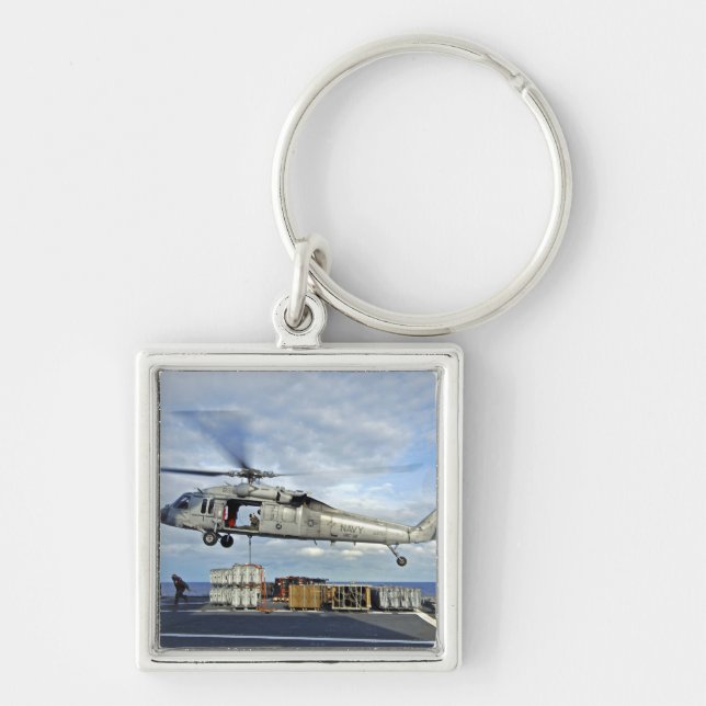 An MH-60S Seahawk prepares to deliver ammunitio Key Ring (Front)