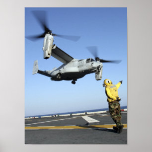 An MV-22 Osprey launches from the USS Nassau Poster