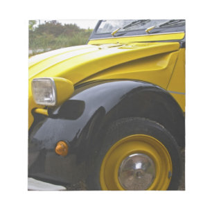 An old black and yellow Citroen 2CV 2 CV, Notepad