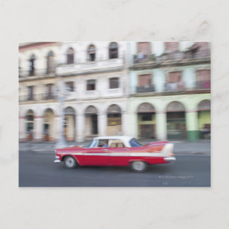 An old car cruising the streets of Havana, Cuba. Postcard