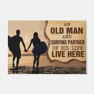 An Old Man And Surfting Partner Of His Life Doormat
