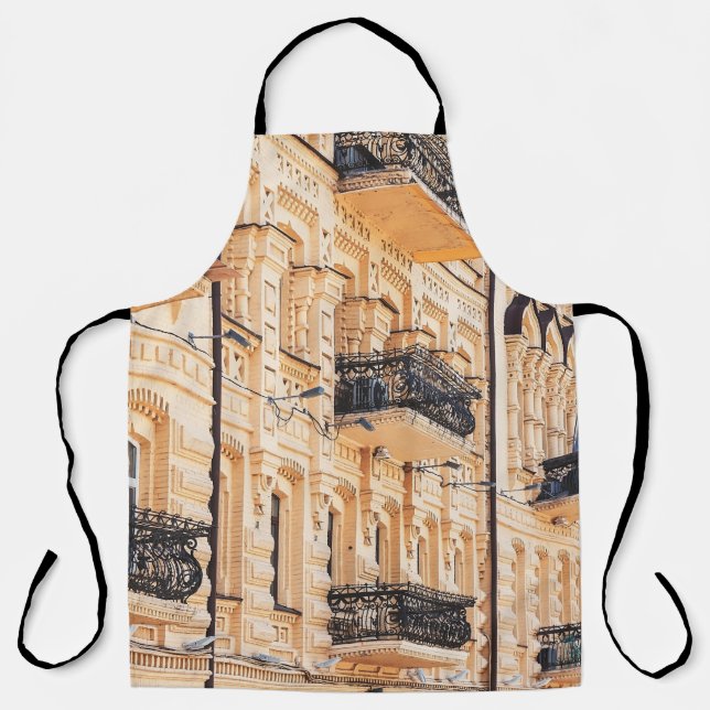 An old yellow house with wrought-iron balconies. f apron (Front)