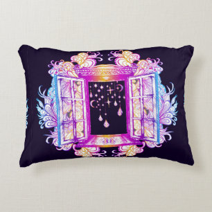 An open vintage window with pendants against a bac decorative cushion