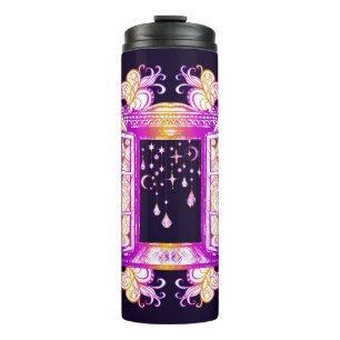 An open vintage window with pendants against a bac thermal tumbler