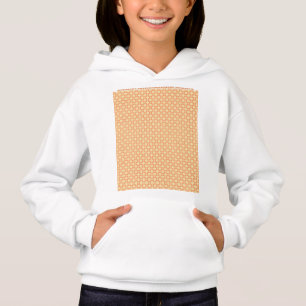 an orange and white background with a pattern