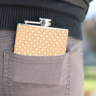 an orange and white background with a pattern hip flask