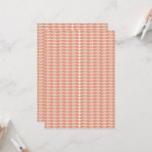 an orange and white pattern on a white background invitation
