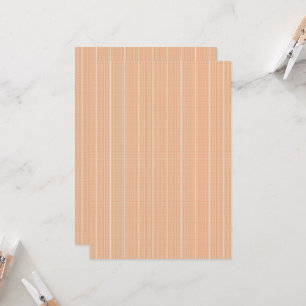 an orange and white striped background with small invitation
