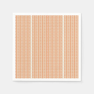 an orange and white striped background with small  napkin