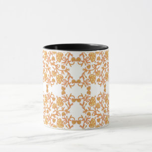 an orange and white wallpaper with a floral design mug