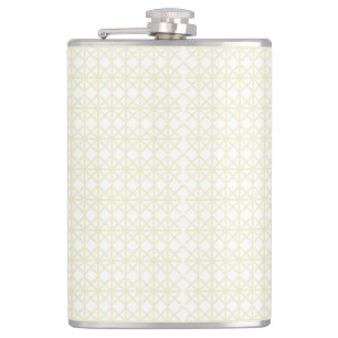 an orange and yellow background with small dots hip flask