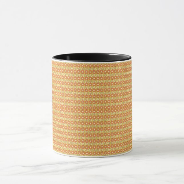 an orange and yellow background with small dots mug (Center)