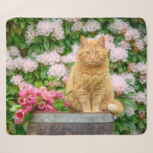 An Orange Cat in a Garden with Pink Spring Flowers Sherpa Blanket