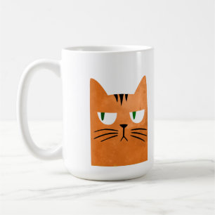 An orange cat with an attitude coffee mug