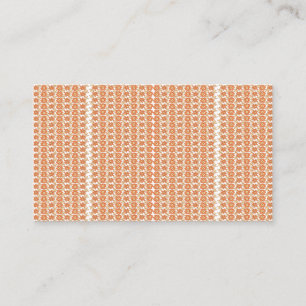 An orange rug with a textured pattern lies flat on business card