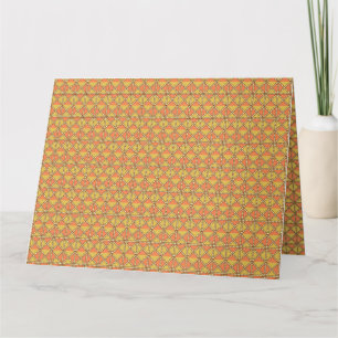 An orange, yellow, and brown symmetrical pattern w card