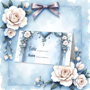 An ornate light blue archway with floral accents,  place card