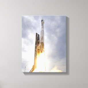 An United Launch Alliance Atlas V rocket lifts Canvas Print