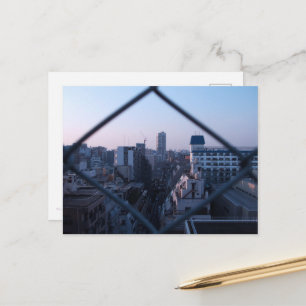 An urban sunset postcard